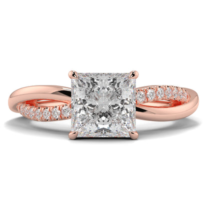 Rose gold ring with a large diamond and smaller diamonds on the band against a white background Yb jewellers engagement ring twist band