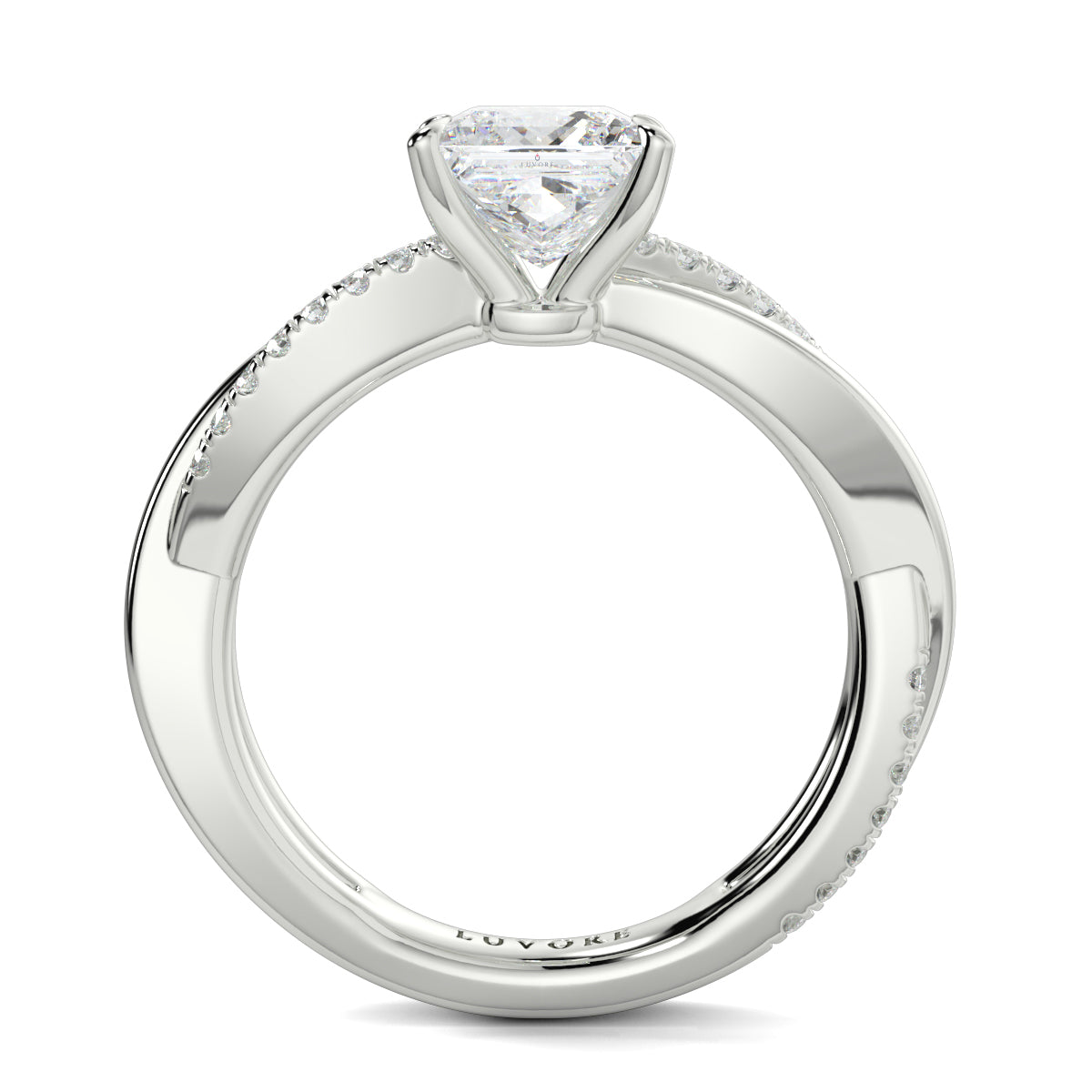 Diamond ring with a heart-shaped center stone on a white background Yb jewellers engagement ring twist band