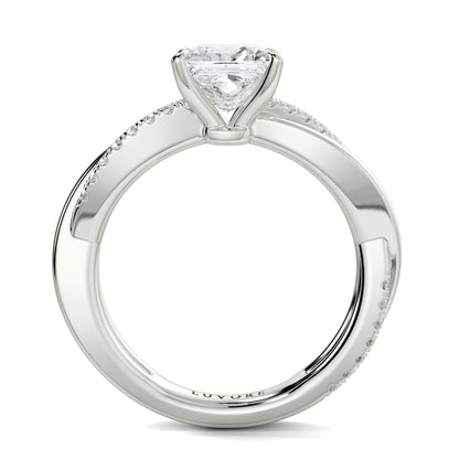 Diamond ring with a heart-shaped center stone on a white background Yb jewellers engagement ring twist band
