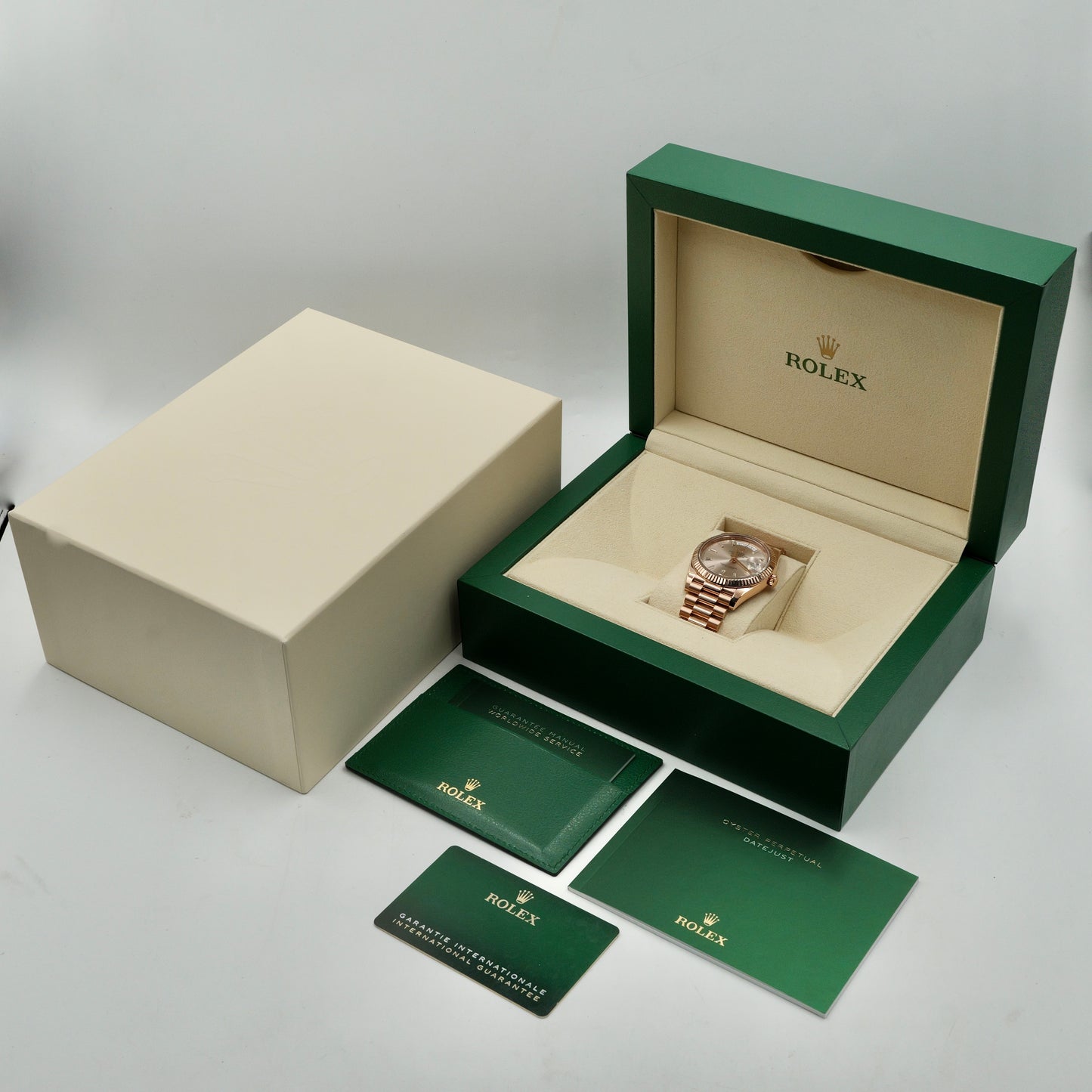 Rolex Day-Date 40 Sundust Baguette Dial 228235 - Full Set (2022)