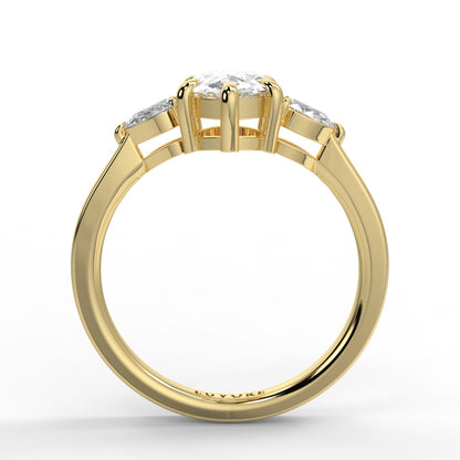 Gold ring with three diamonds on a white background _yb_jewellers_3_stone_trilogy_engagement_ring_round_and_pear_shape_best_selling_design_trending_diamond_ring