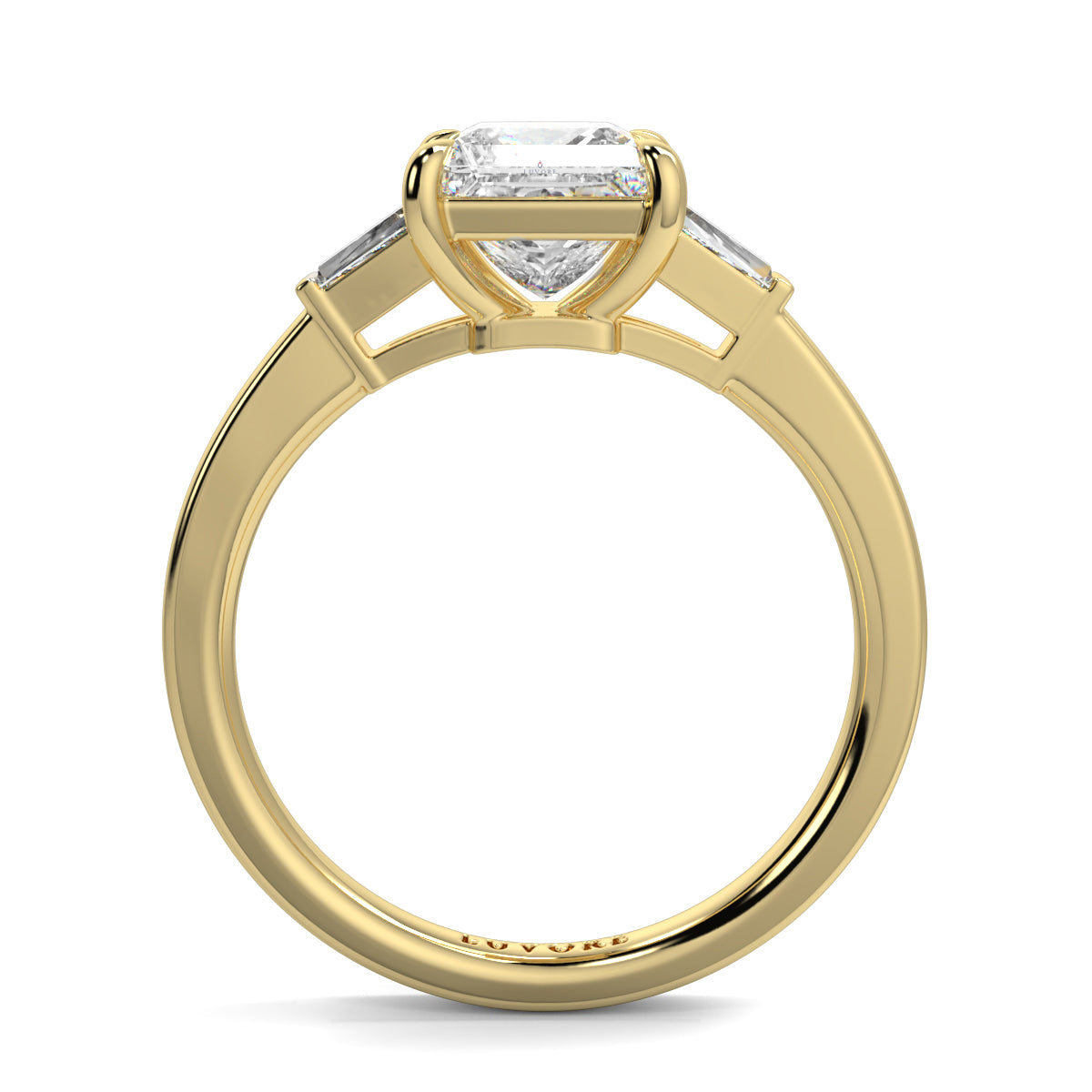 Gold ring with a diamond on a white background yb_jewellers_3_stone_trilogy_engagement_ring_round_and_pear_shape_best_selling_design_trending_diamond_ring