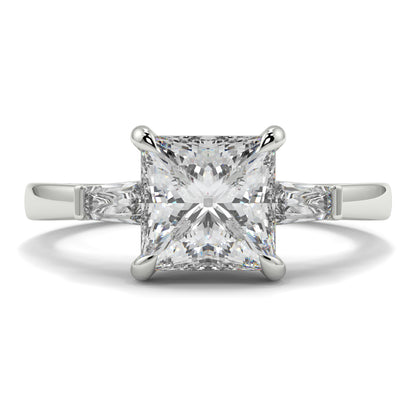 Diamond ring with a square-cut gemstone on a white background yb_jewellers_3_stone_trilogy_engagement_ring_round_and_pear_shape_best_selling_design_trending_diamond_ring