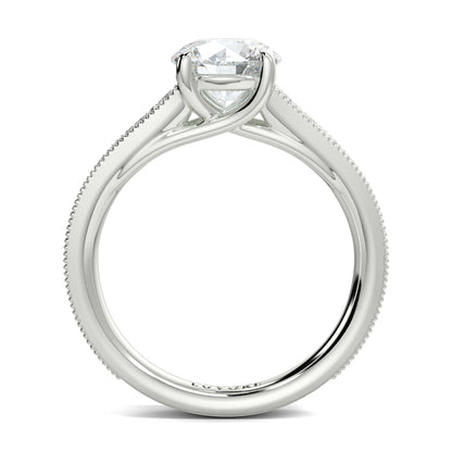 Silver ring with a diamond on a white background yub jewellers platinum side view engagement ring