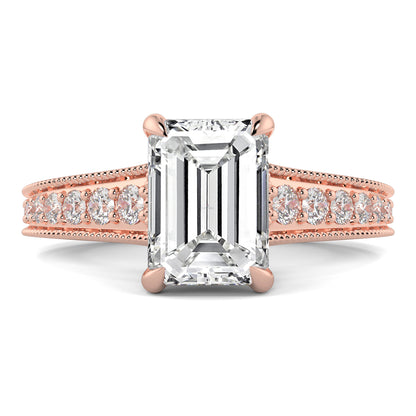 Rose gold ring with emerald-cut diamond and smaller diamonds on a white background yb jewellers platinum grain set engagement ring 