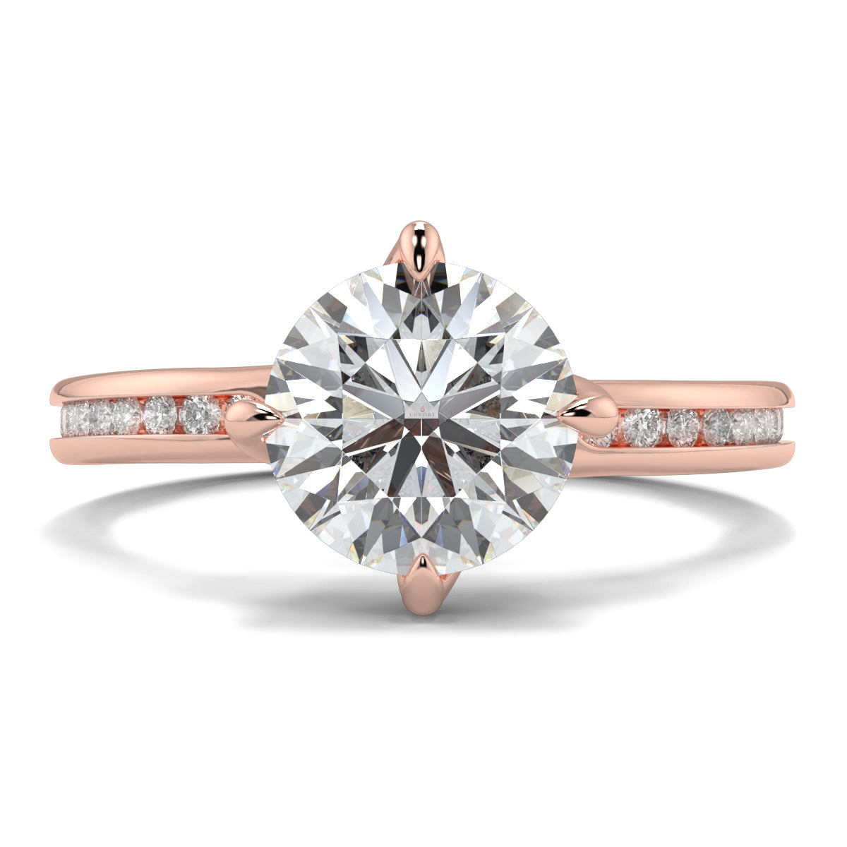 Rose gold ring with a large diamond and smaller diamonds on the band against a white background Yb jewellers engagement ring straight band