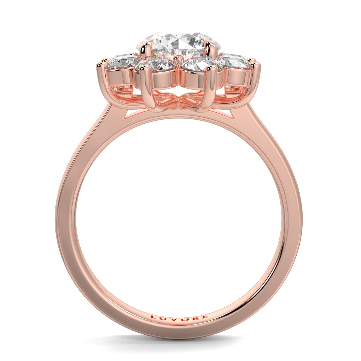 Rose gold ring with three diamonds on a white background yb jewellers cluster halo ring engagement ring grain set halo round shape plain band