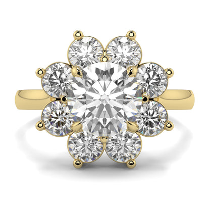 Gold ring with a central diamond and smaller diamonds around on a white background yb jewellers cluster halo ring engagement ring grain set halo round shape plain band