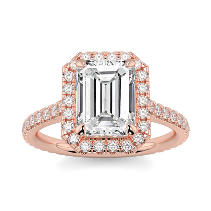 Rose gold ring with emerald-cut diamond and smaller diamonds on a white background YB_Jewellers_Engagement_Ring