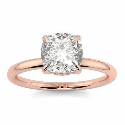 Rose gold ring with a large diamond on a white background yb jewellers solitaire engagement ring best selling design cushion shape diamond 4 claw with a slim band
