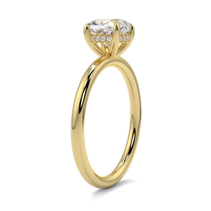 Gold ring with a diamond on a white background yb jewellers solitaire engagement ring best selling design cushion shape diamond 4 claw with a slim band