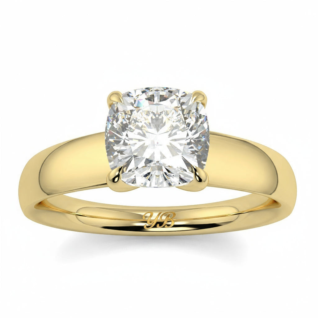 Gold ring with a large diamond on a white background yb_jewellers_solitaire_engagement_ring_4_claw_diamond_centre_lab_grown_diamond_round_brilliant_best_selling_engagement_ring