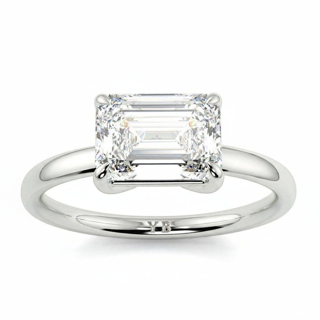 Silver ring with emerald-cut diamonds on a white background yb jewellers 4 claw emerald diamond engagement ring best selling design with a thin band 