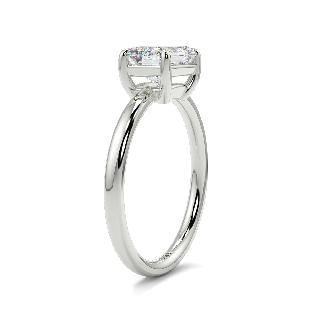 Diamond ring with a rectangular stone on a white background yb jewellers 4 claw emerald diamond engagement ring best selling design with a thin band 