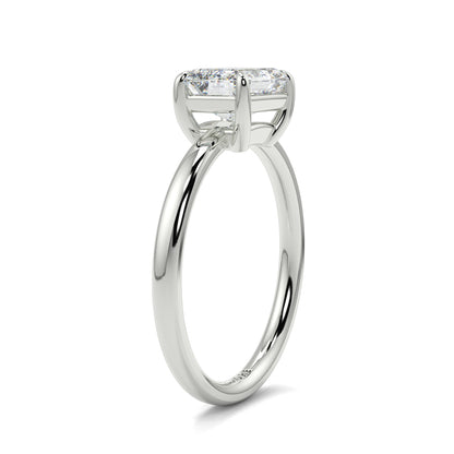 Diamond ring with a rectangular stone on a white background yb jewellers 4 claw emerald diamond engagement ring best selling design with a thin band 