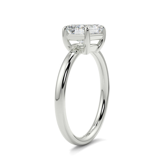 Diamond ring with a rectangular stone on a white background yb jewellers 4 claw emerald diamond engagement ring best selling design with a thin band 