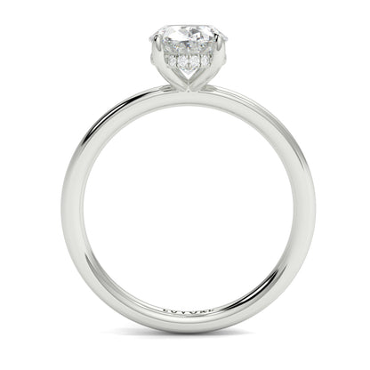 Diamond ring with a white gold band on a white background yb_jewellers_solitaire_engagement_ring_best_selling_design_cushion_shape_diamond_4_claw_with_a_slim_band