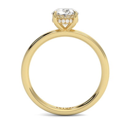 Gold ring with a diamond on a white background yb_jewellers_solitaire_engagement_ring_best_selling_design_cushion_shape_diamond_4_claw_with_a_slim_band