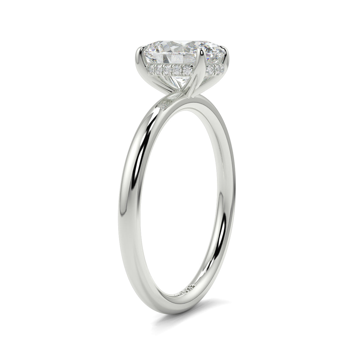 Diamond ring on a white background yb_jewellers_solitaire_engagement_ring_best_selling_design_cushion_shape_diamond_4_claw_with_a_slim_band