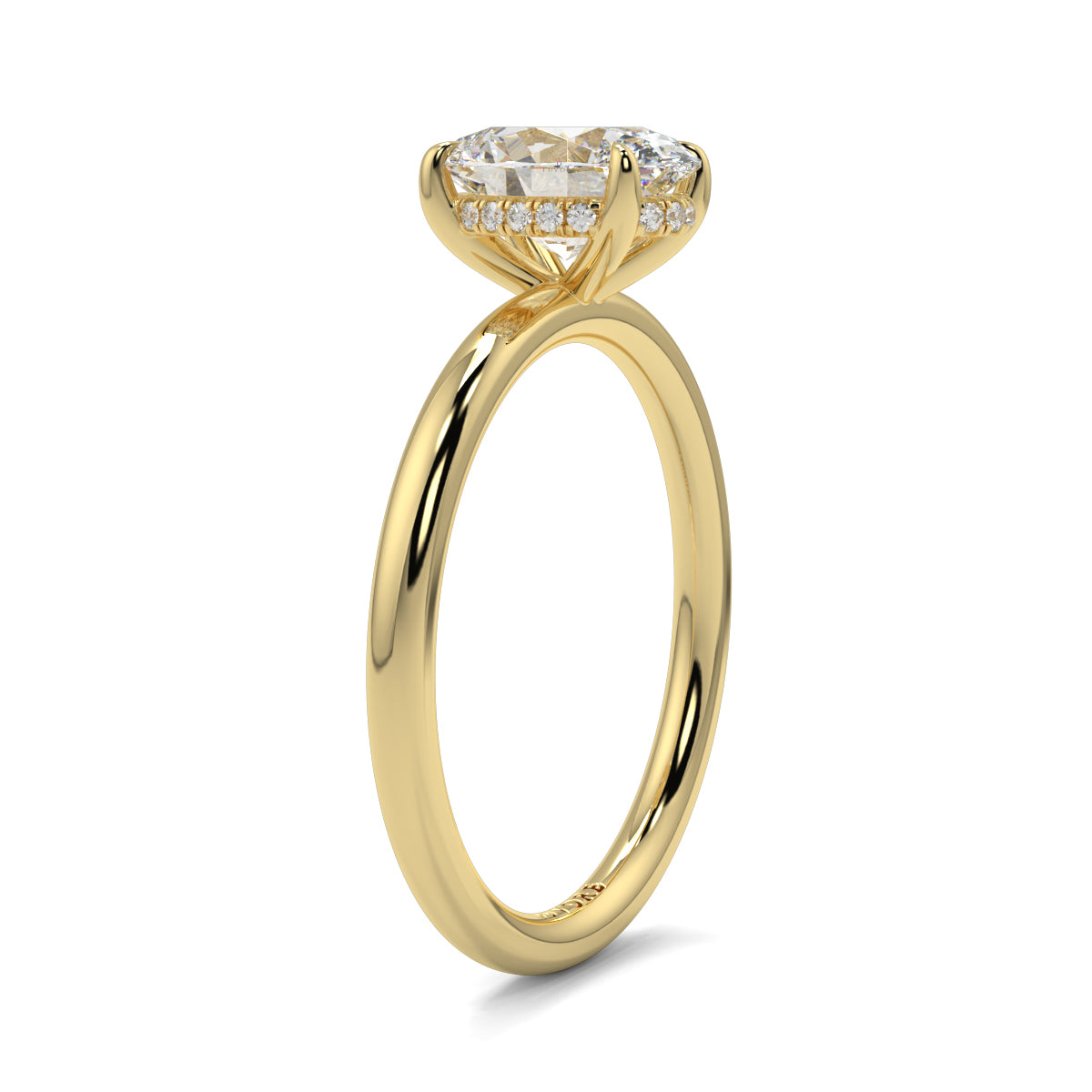 Gold ring with a diamond on a white background yb_jewellers_solitaire_engagement_ring_best_selling_design_cushion_shape_diamond_4_claw_with_a_slim_band