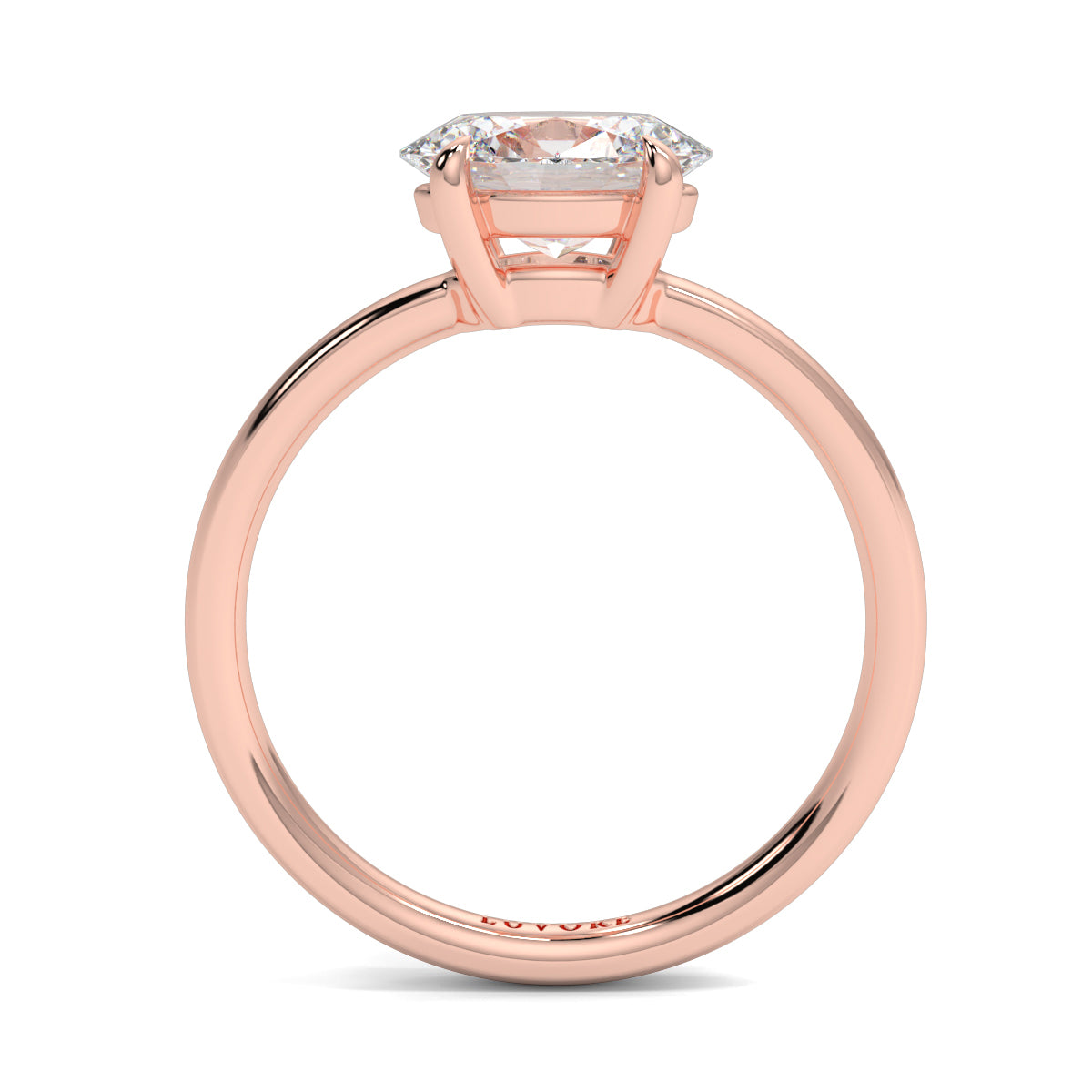 Rose gold ring with a diamond on a white background yb_jewellers_4_claw_emerald_diamond_engagement_ring_best_selling_design_with_a_thin_band