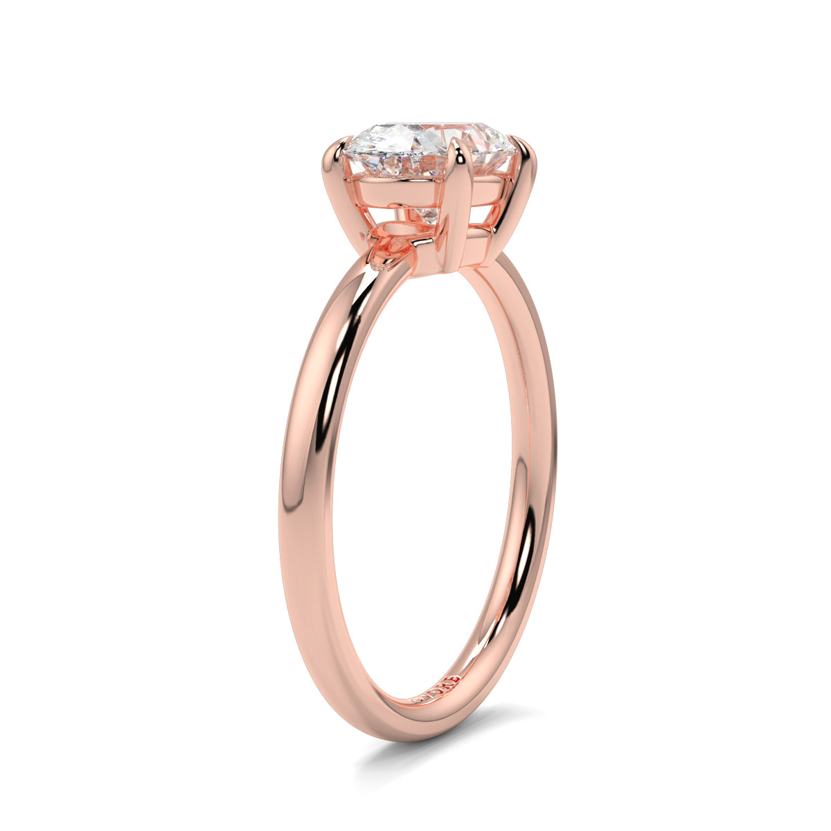 Rose gold ring with a diamond on a white background yb_jewellers_4_claw_emerald_diamond_engagement_ring_best_selling_design_with_a_thin_band