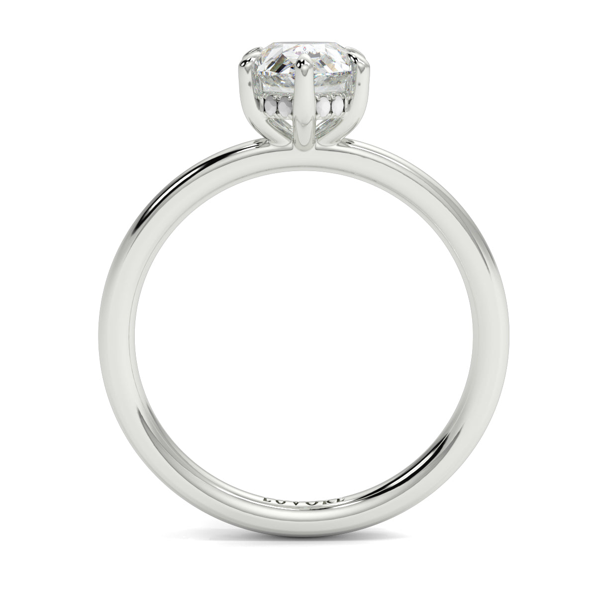 Silver ring with a heart-shaped diamond on a white background _yb_jewellers_solitaire_engagement_ring_best_selling_design_cushion_shape_diamond_4_claw_with_a_slim_band