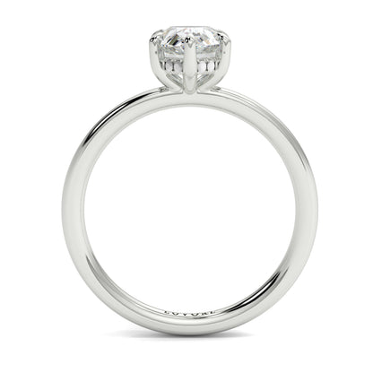 Silver ring with a heart-shaped diamond on a white background _yb_jewellers_solitaire_engagement_ring_best_selling_design_cushion_shape_diamond_4_claw_with_a_slim_band