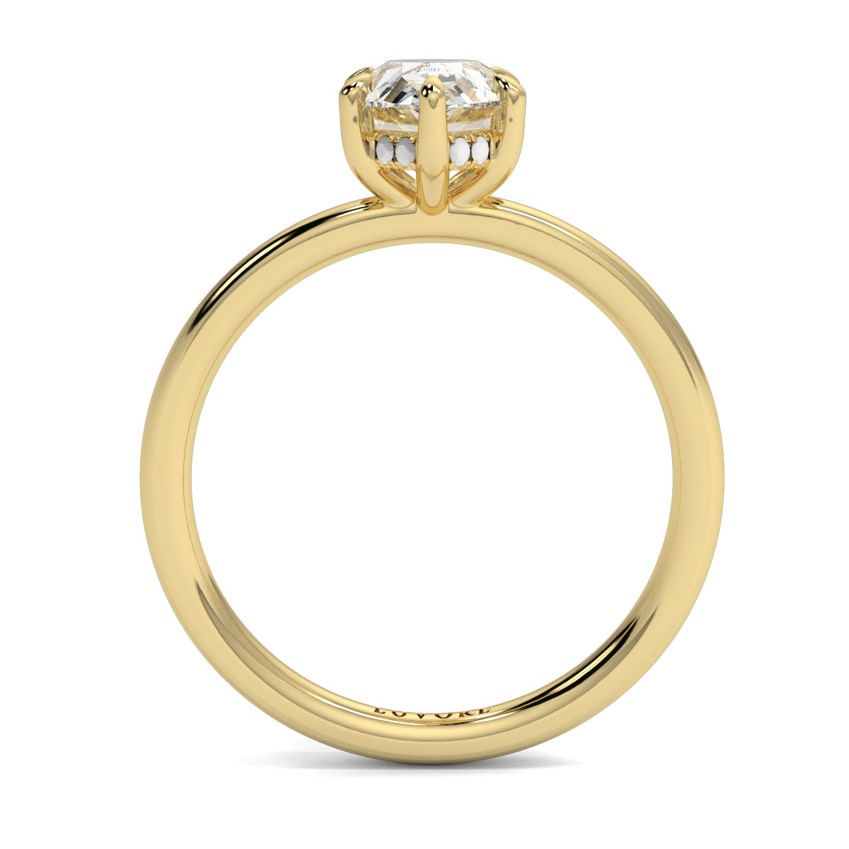 Gold ring with a diamond on a white background _yb_jewellers_solitaire_engagement_ring_best_selling_design_cushion_shape_diamond_4_claw_with_a_slim_band