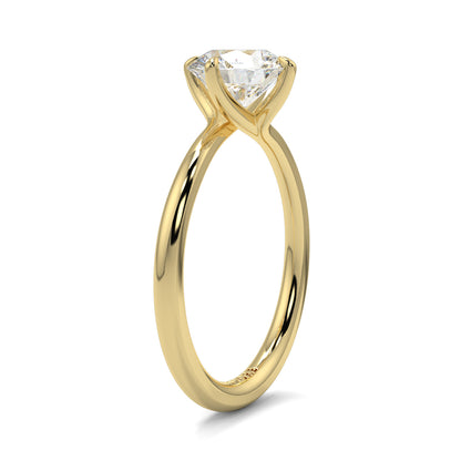 Gold ring with a clear gemstone on a white background yb jewellers twist band engagement ring best selling design round diamond trending rings