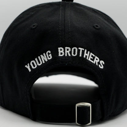 Black cap with 'YOUNG BROTHERS' embroidery on a gray background