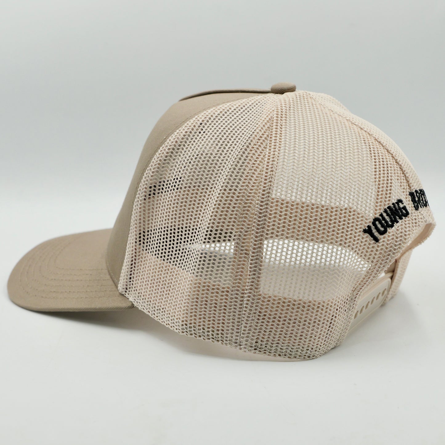 Beige mesh cap with  logo on a light gray background