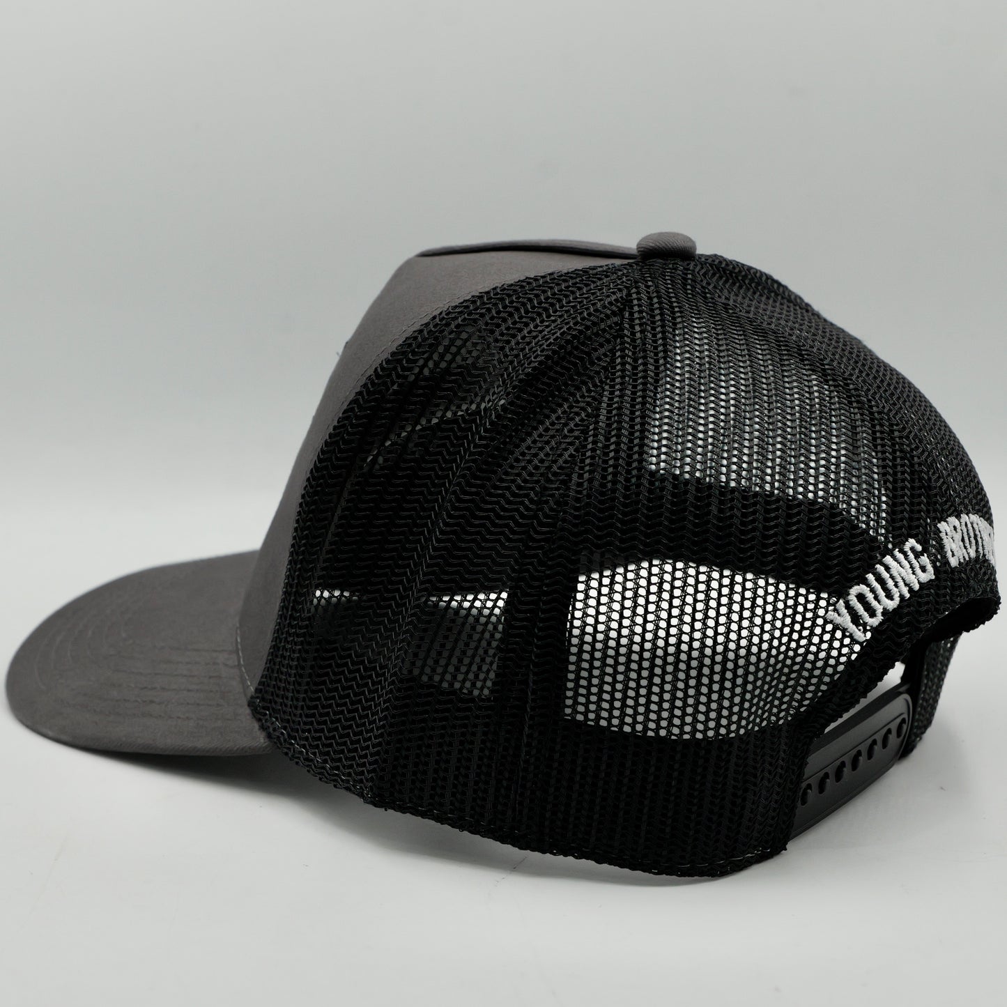 Black mesh cap with 'Young Brothers' branding on a gray background