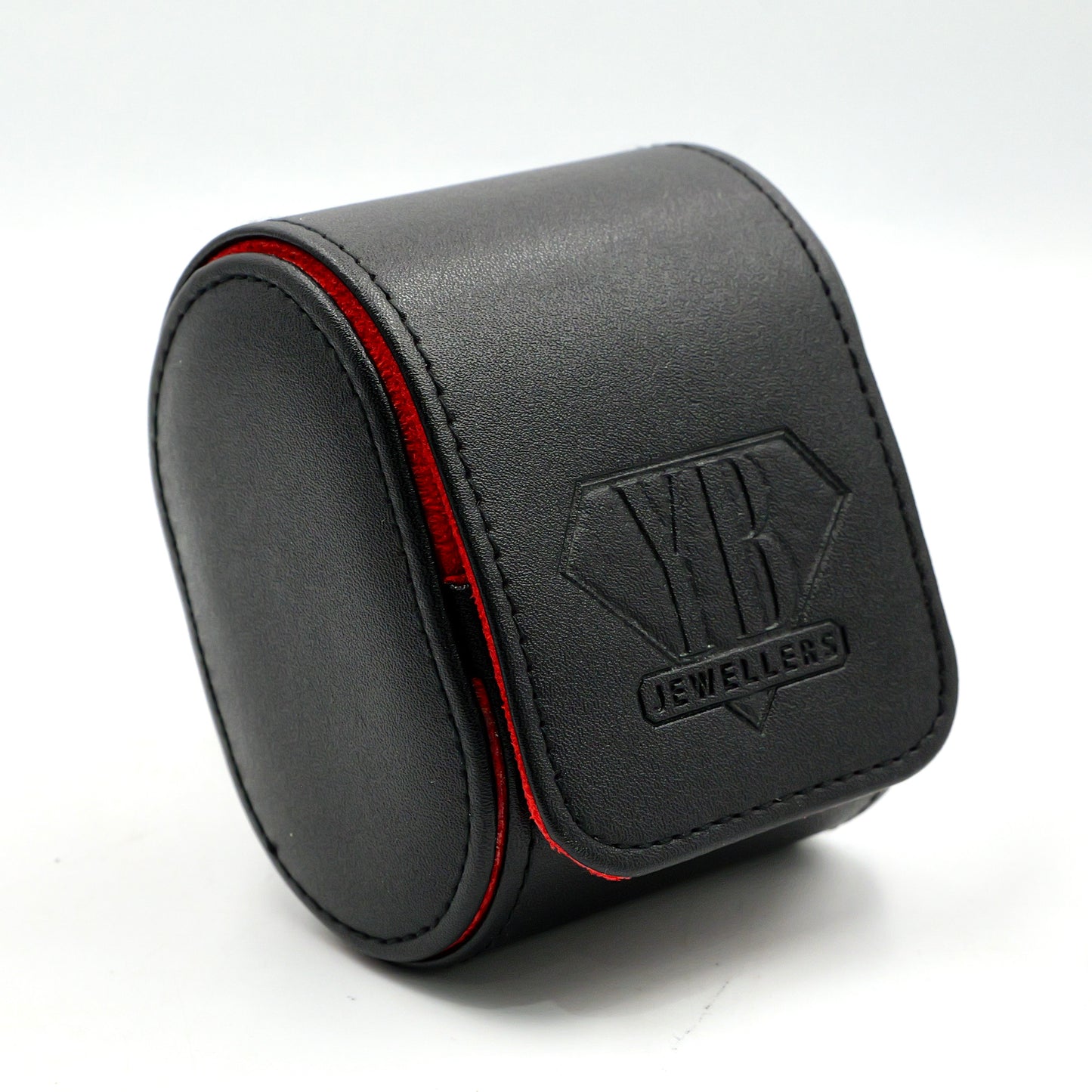 Black jewelry box with red interior on a white background