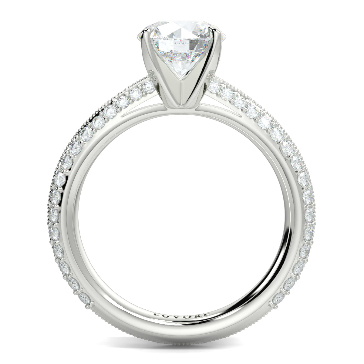 Silver ring with a large diamond and smaller diamonds on the band against a white background yb jewellers