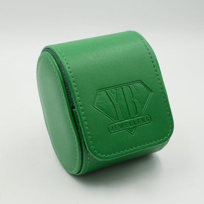 Green jewelry box with 'YB Jewellers' logo on a light gray background