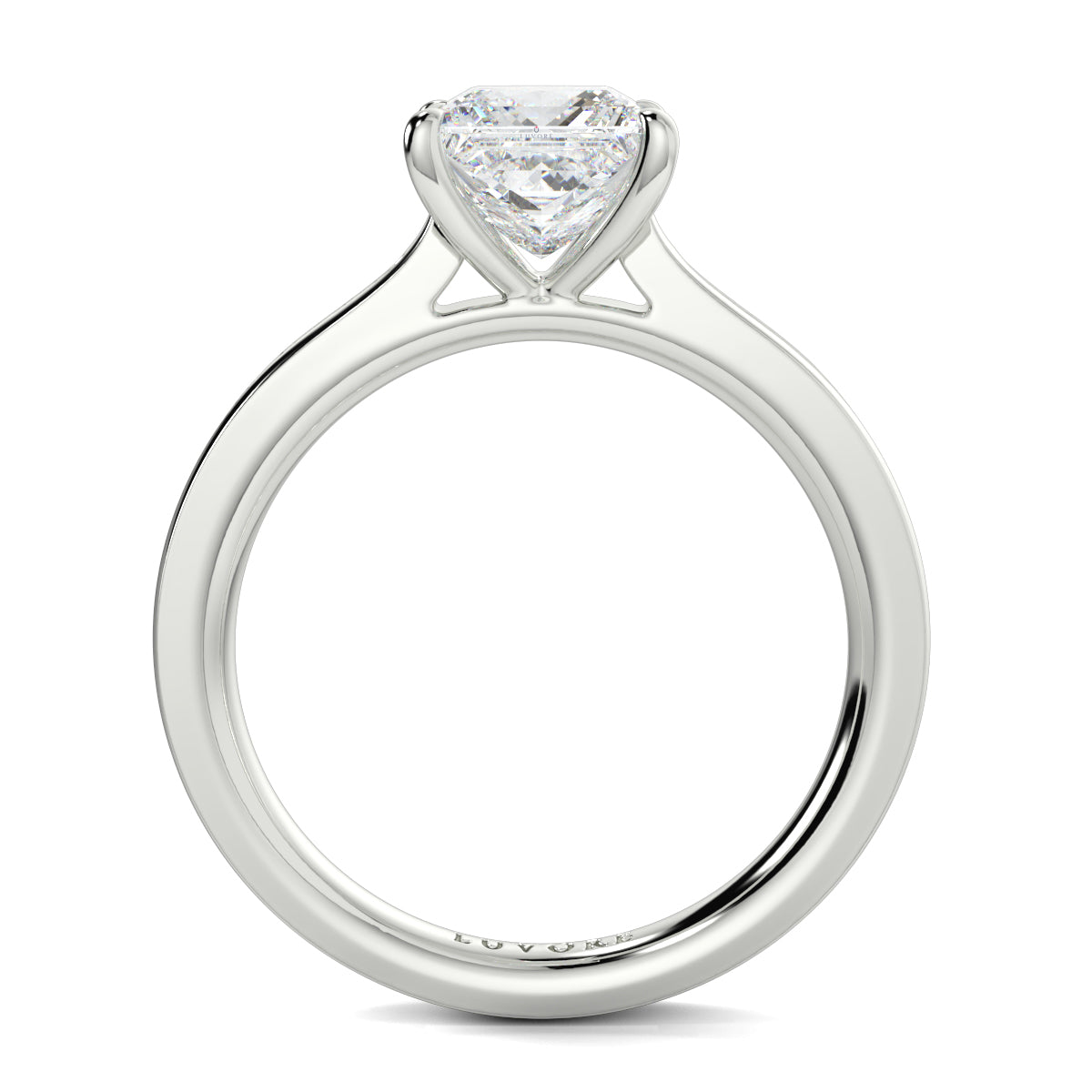Diamond ring with a heart-shaped center stone on a white background Yb jewellers engagement ring straight band
