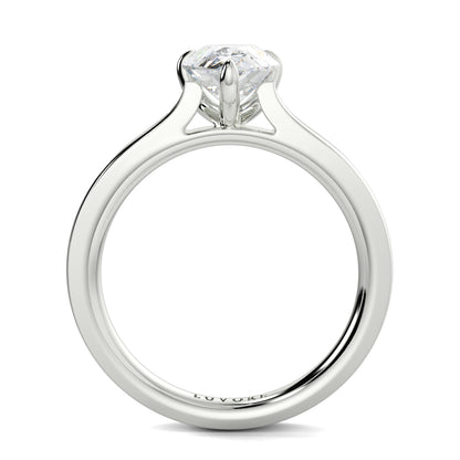Silver ring with a diamond on a white background Yb jewellers engagement ring straight band