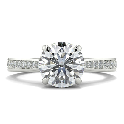 Diamond ring with a white gold band on a white background Yb jewellers engagement ring straight band