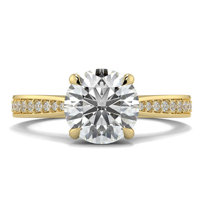 Gold ring with a large diamond and smaller diamonds on the band against a white background Yb jewellers engagement ring straight band