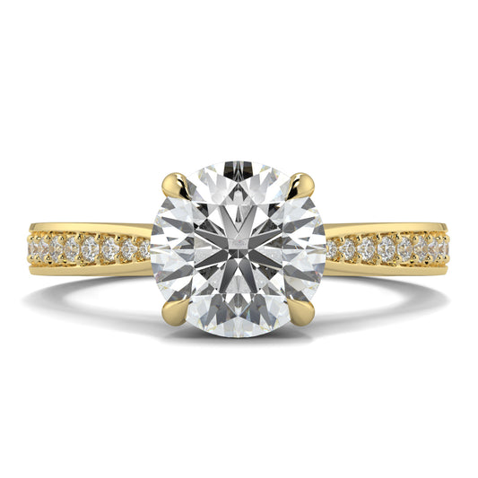 Gold ring with a large diamond and smaller diamonds on the band against a white background Yb jewellers engagement ring straight band