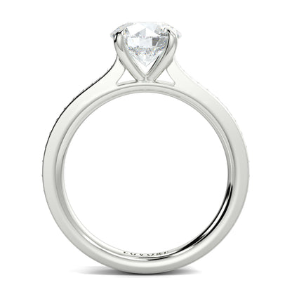 Diamond ring with a clear gemstone on a white background Yb jewellers engagement ring straight band