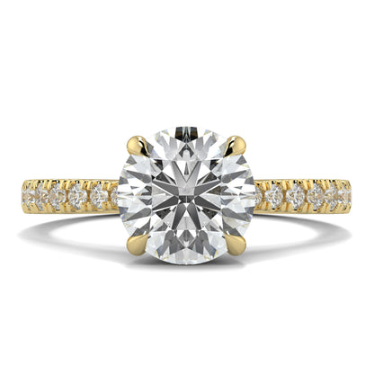 Gold ring with a large diamond and smaller diamonds on the band against a white background Yb jewellers engagement ring straight band