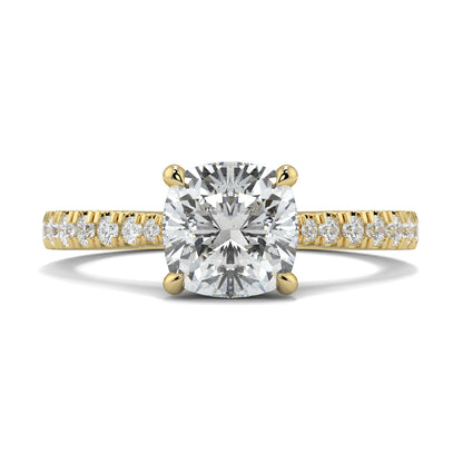 Gold ring with a large diamond and smaller diamonds on the band against a white background Yb jewellers engagement ring straight band