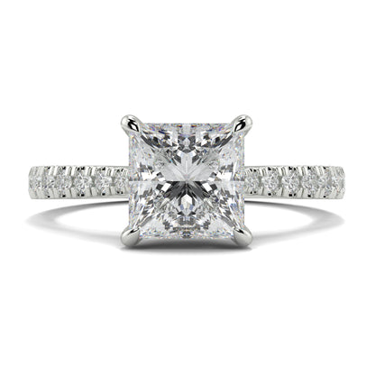 Diamond ring with a princess-cut diamond on a white background Yb jewellers engagement ring straight band
