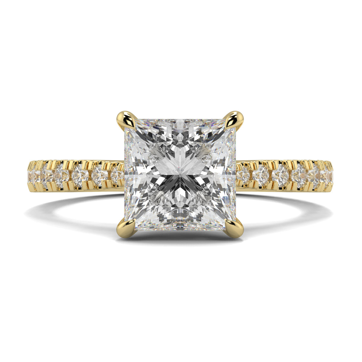 Gold ring with a large diamond and smaller diamonds on the band against a white background Yb jewellers engagement ring straight band princess diamond