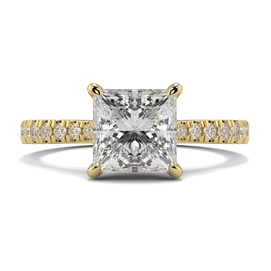 Gold ring with a large diamond and smaller diamonds on the band against a white background Yb jewellers engagement ring straight band princess diamond