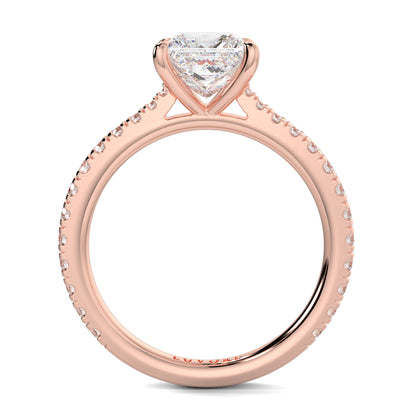 Rose gold ring with a heart-shaped diamond on a white background Yb jewellers engagement ring straight band princess diamond