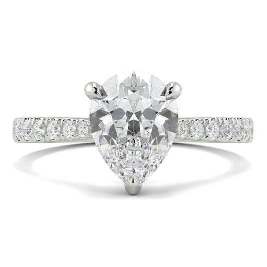 Diamond ring with a pear-shaped center stone on a white background Yb jewellers engagement ring straight band pear diamond
