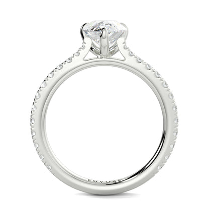 Diamond ring with a white gemstone on a white background Yb jewellers engagement ring straight band pear diamond